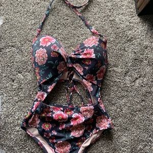 . Larger cup size but fits like a med